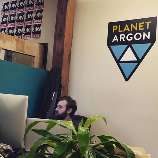 Planet Argon - logo v3 on wall